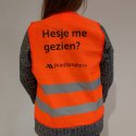 Het oranje PrintSimple veilgheidshesje